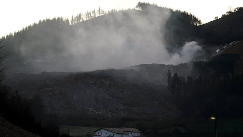 Smoke rises from the  landfill site in Zaldibar on Saturday. Photograph: Vincent West/Reuters