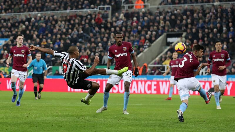 N  Salomon Rondon  shoots during the Premier League match between Newcastle United and West Ham United. Photograph:  Ian MacNicol/Getty Images