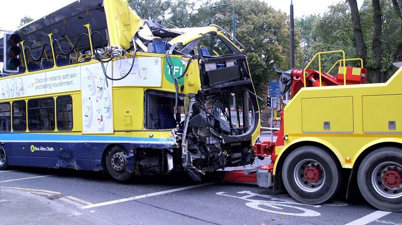 The Dublin bus involved in the crash, being removed from the scene. Photograph: Bryan O Brien/The Irish Times