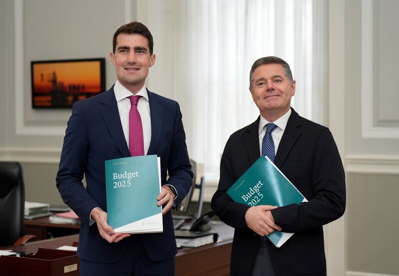 Minister for Finance Jack Chambers and Minister for Public Expenditure Paschal Donohoe after speaking to the media at the Department of Finance last night. Photograph  Niall Carson/PA Wire