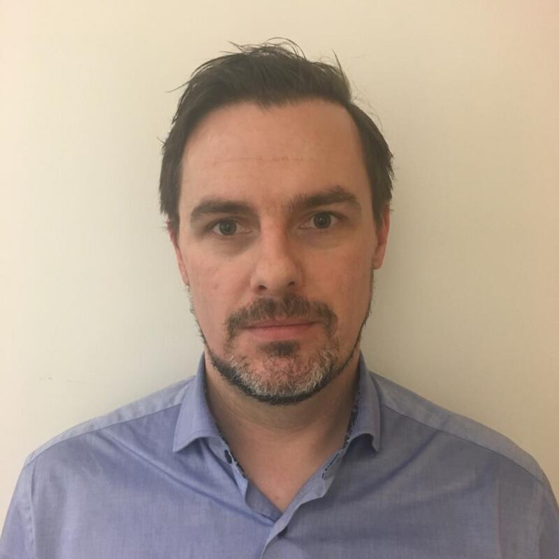 Byline photo of Dr Ross Woods