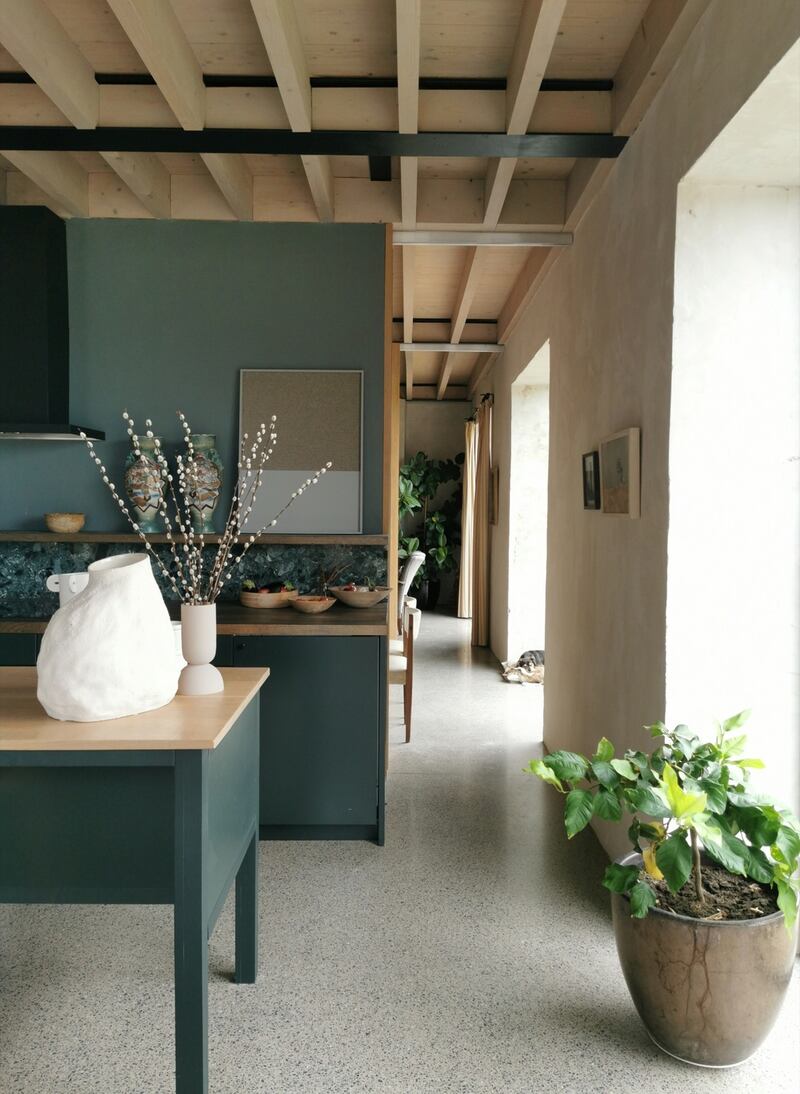To create the illusion of space, Eavan English opened up the ceiling, exposing rafters