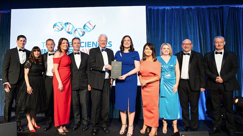Matt Moran, awards judge, presents the overall excellence in life sciences to the Takeda Ireland team