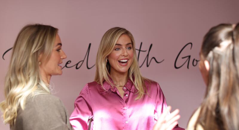 Aimee Connolly chats with colleagues at the company's HQ in Dundrum, Co Dublin. Photograph: Bryan O’Brien