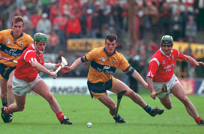 Ollie Baker of Clare with of Fergal Ryan and Timmy Kelleher of Cork during that famous 1995 clash. Photograph: Lorraine O'Sullivan/Inpho