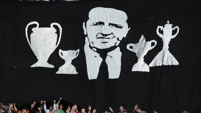 Celtic fans hold a minute’s applause prior to the  Premier League match between Celtic and Hearts in 2010 to mark the 25th anniversary of Jock Stein’s death at Celtic Park.  Photograph: Photograph:  Jeff J Mitchell/Getty Images