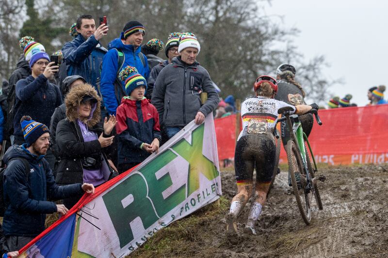 Judith Krahl of Germany competes in the women's elite race as the crowd looks on. Photograph: Tom Honan 