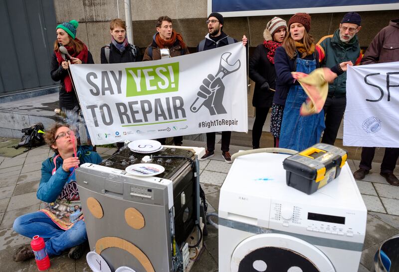 Activists in Brussels demonstrate against the planned obsolescence of devices, in 2019. Photograph: Thierry Monasse/Getty Images