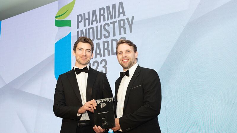 Joseph Leydon, chief operating officer at LotusWorks, presents the innovation of the year award to Peter Blennerhassett, Blynksolve