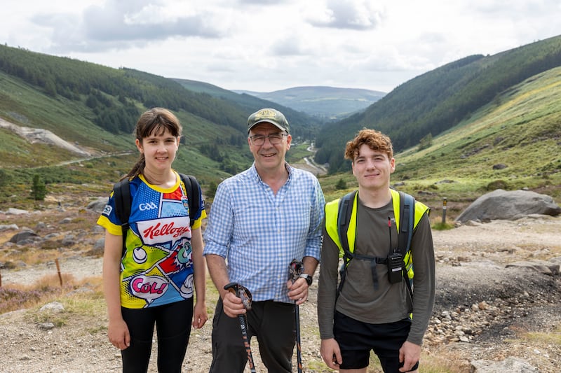 Lillian Harney aged 12 and her father Lorcan Harney (Guide) and Jonas Klauer aged 17 (Guide) on the Saint Kevin's Way Pilgrim Path. Photograph: Tom Honan 