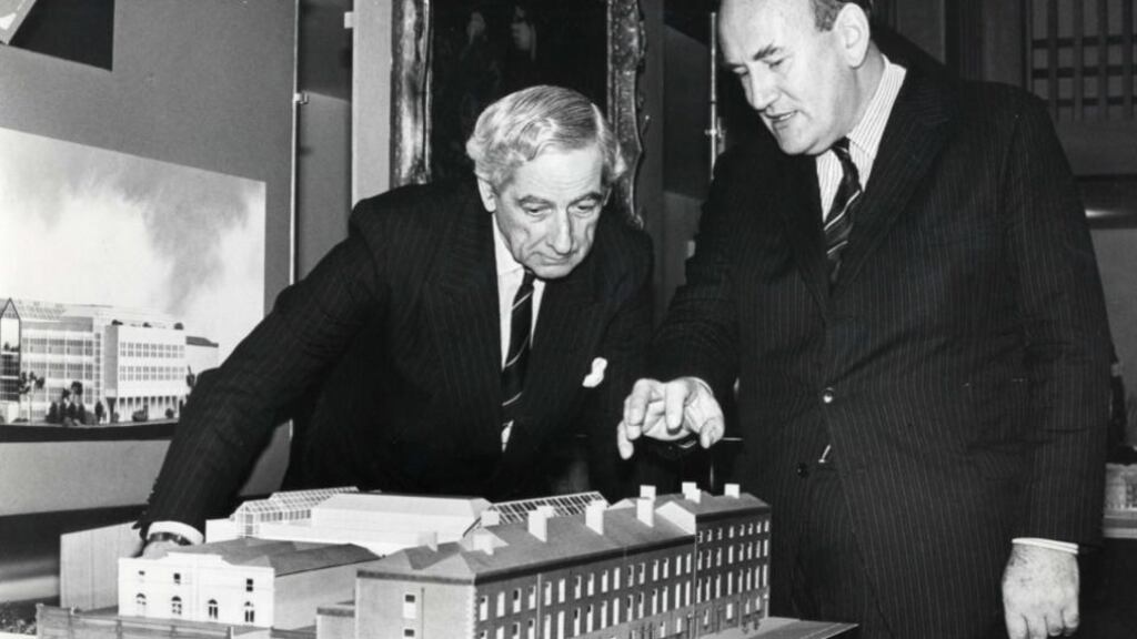 Frank O’Reilly (left) at a reception to announce building plans in TCD in 1988 with then provost Dr WA Watts
