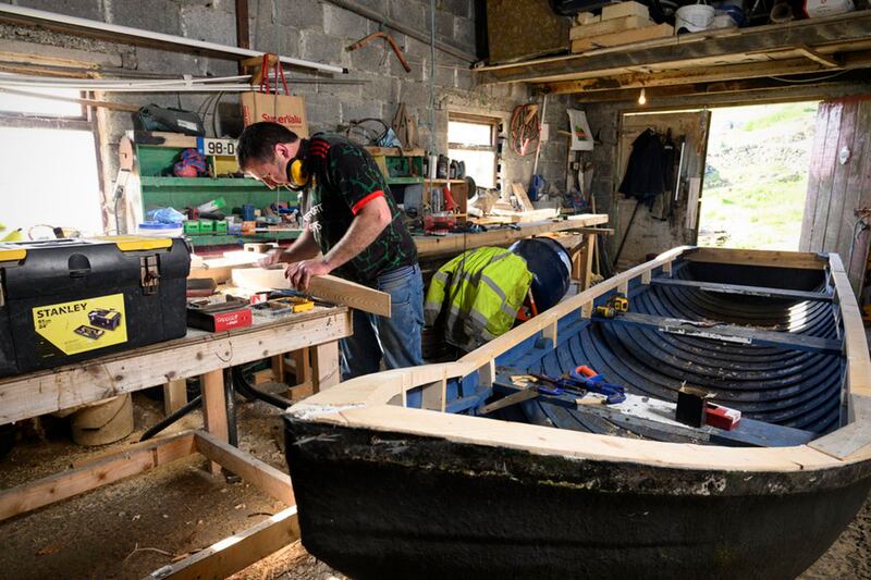 Inishturk islander Richard O'Toole builds a currach, continuing the legacy of boat building that has shaped generations. 