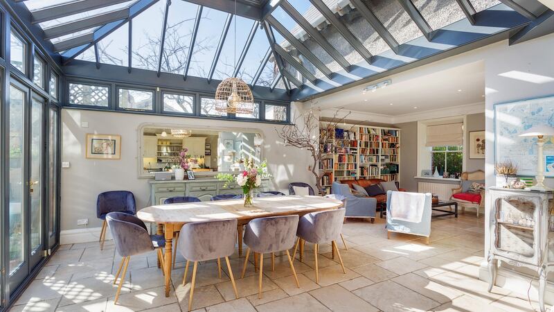 There is a second conservatory in the dining area of the kitchen flooding the room with light.