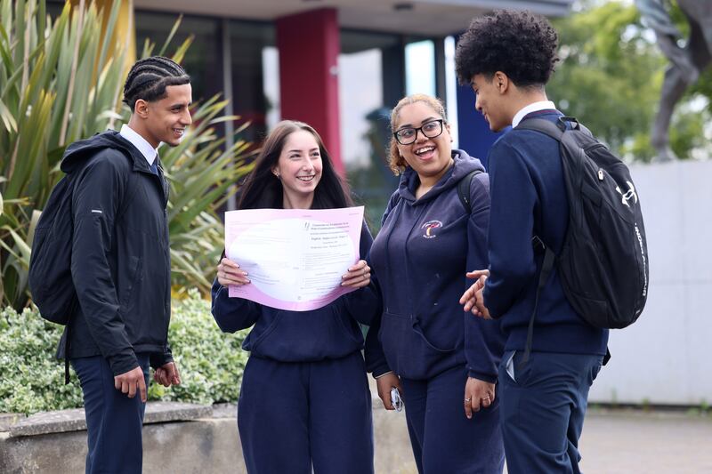 Students Aziz Abdulnasser (left) and his twin Rahaman (right) with Sara Pohorski and Ahlam Omar discuss their Leaving Cert exams on Wednesday at Trinity Comprehensive School, Ballymun, Dublin.
Photograph: Dara Mac Dónaill 