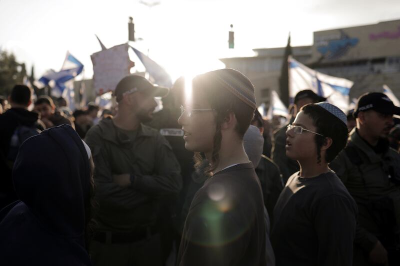 Young supporters of Mr Netanyahu arriving for a counter-demonstration in Jerusalem. Photograph: Avishag Shaar-Yashuv/The New York Times
                      