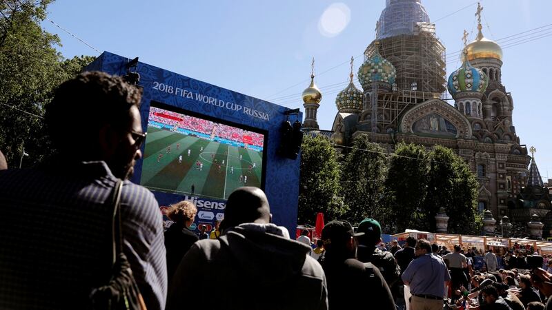 Fans watch the broadcast of Portugal v Morocco  at  the Saint Petersburg Fan Fest. Photograph: Henry Romero/Reuters