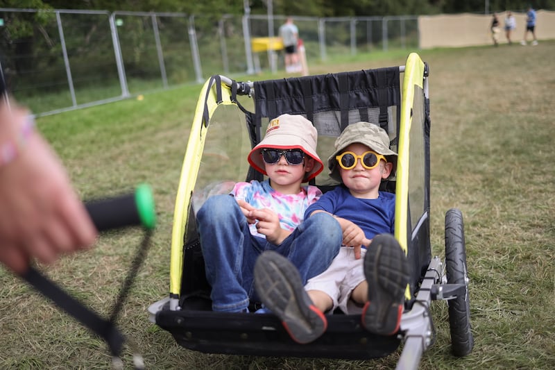 Seamus Ryan (left), aged four, and Rory Ryan, aged two, from Co Tipperary arrive at the festival. Photograph: Dan Dennison