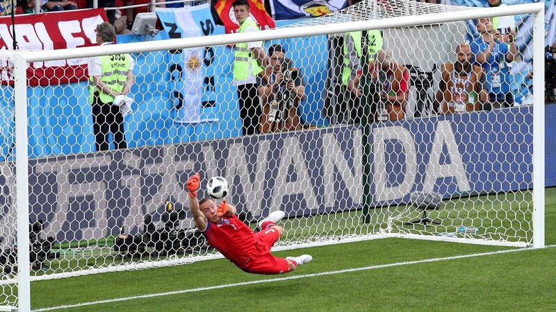 Hannes Halldorsson is equal to Lionel Messi’s penalty in Moscow. Photograph: Clive Rose/Getty