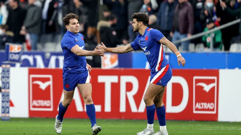 France’s Antoine Dupont celebrates scoring their first try with Romain Ntamack. Photograph: Dan Sheridan/Inpho