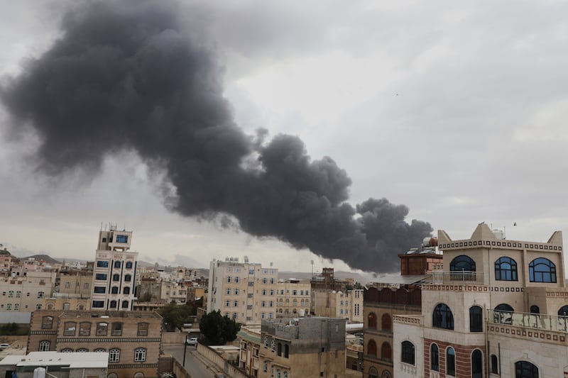 Smoke billows following Israeli airstrikes targeting a power plant and Sanaa Airport in Yeman. Photograph: Osamah Abdulrahman/AP