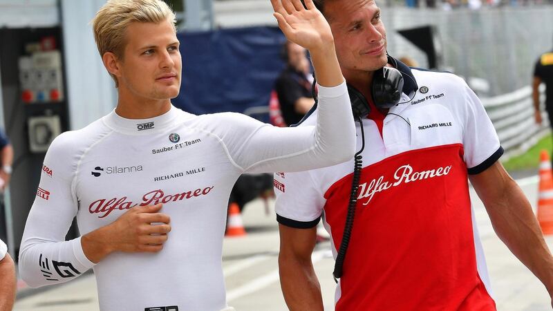 Ericsson  returns to the pitlane after a medical checkup. Photo: Daniel Dal Zennaro/EPA