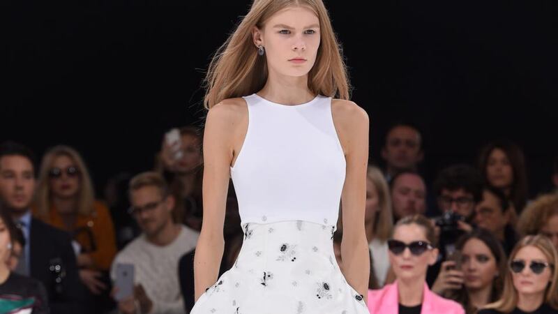 A model in  Christian Dior on the catwalk at  Paris Fashion Week. Photograph:  Pascal Le Segretain/Getty Image