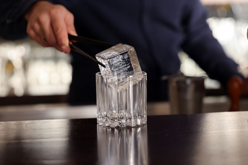 The start of a Pinesmoked Cherry and Beetroot Negroni at D'Olier Street. Photograph: Alan Betson