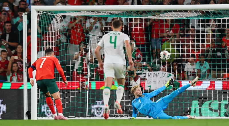Ireland goalkeeper Caoimhín Kelleher saves Cristiano Ronaldo's penalty. Photograph: Ryan Byrne/Inpho