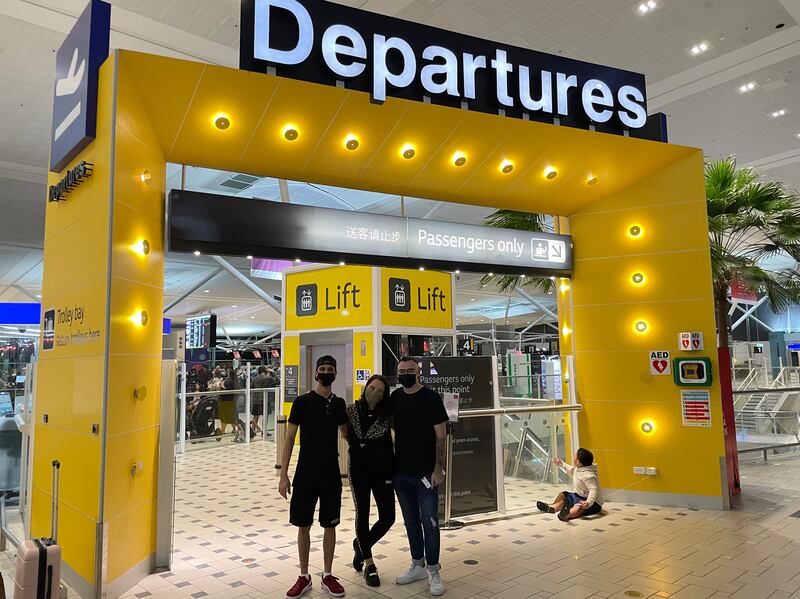 Departure gate: Nicola Holly at Brisbane International Airport with her husband, Chayse, and her best friend Paudie, who is also from Tralee and also lives in Brisbane