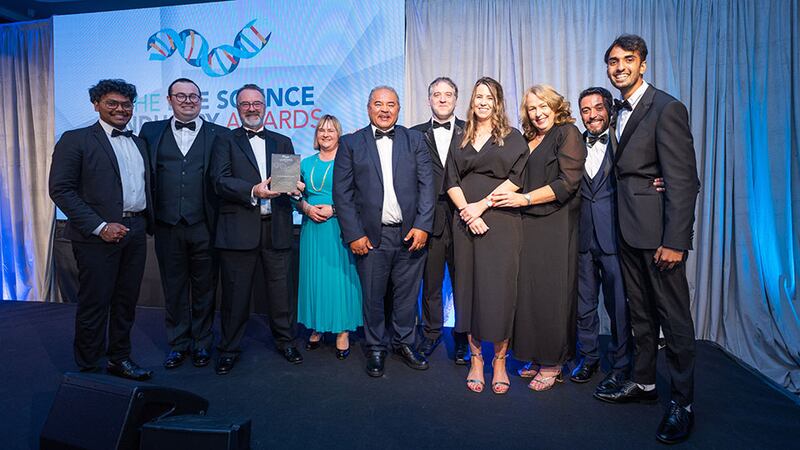 Marie Walsh, partner and patent attorney, HGF, presents the product impact award to the DMF Systems team. Photograph: Jospeh Carr Photography