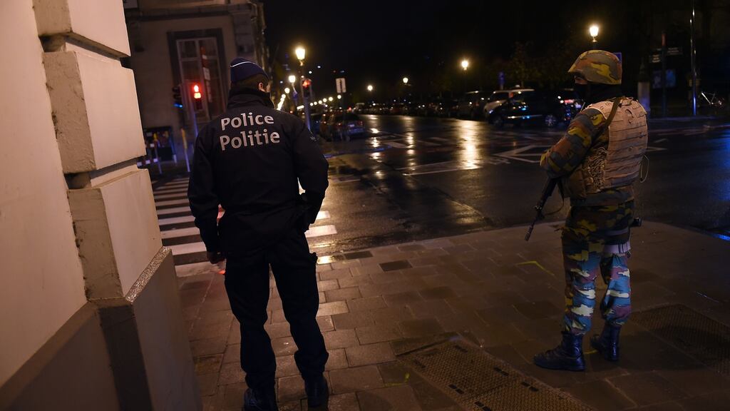 A Belgian policeman and a serviceman secure an area during a press conference by the Belgian prime minister concerning the country’s security alert level in Brussels on November 22nd, 2015. Photograph: Emmanuel Dunand/AFP/Getty Images