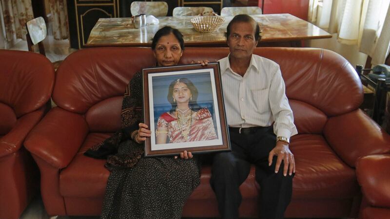 Mahadevi and Andaneppa Yalagi, parents of Savita Halappanavar, hold her portrait  at their house in India in  November  2012.  Photograph: Danish Siddiqui/Reuters