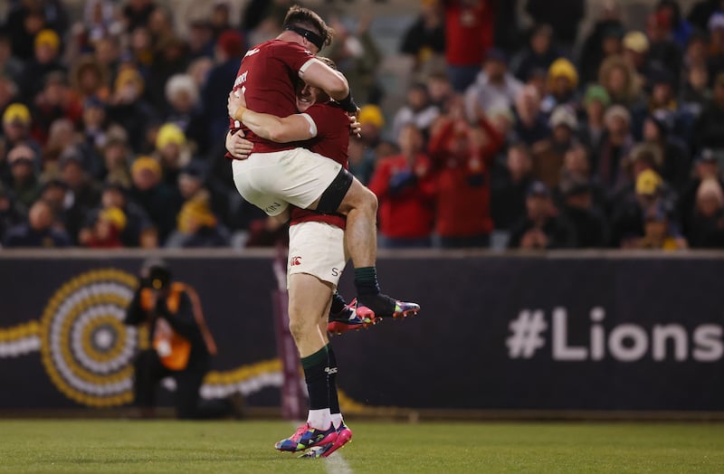 Garry Ringrose celebrates with team-mate Tom Curry after scoring a try. Photograph: Mark Metcalfe/Getty Images