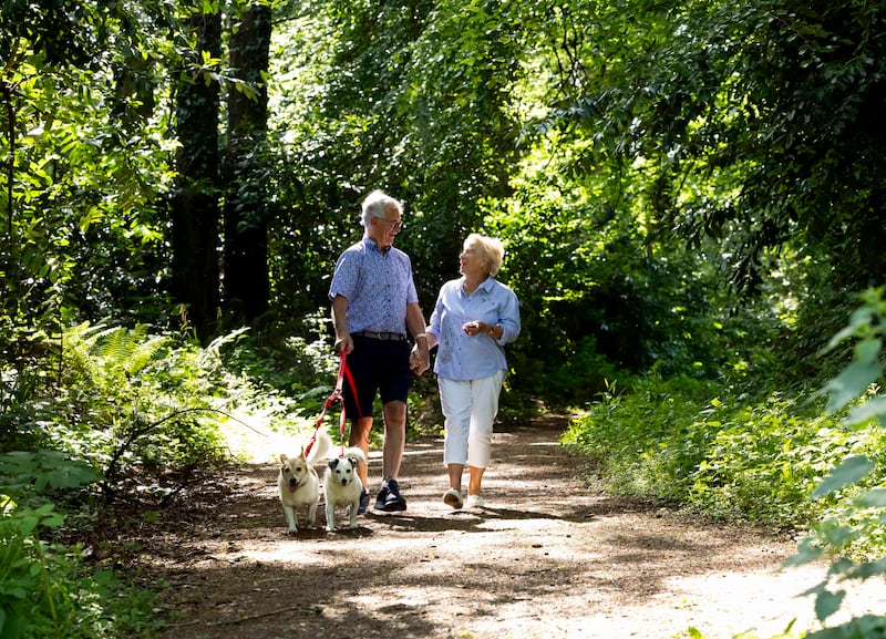 Rina and Brian Beechey with their dogs Tilly and Tuppence in Courtown woods, Co Wexford. Photograph: Mary Browne