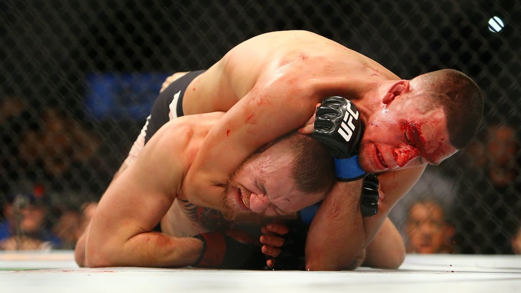 Nate Diaz applies a choke hold to win by submission against Conor McGregor during UFC 196 at the MGM Grand Garden Arena. Photograph: Rey Del Rio/Getty Images