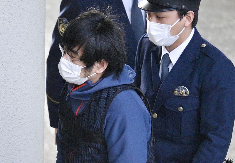 Tetsuya Yamagami enters a police station in Nara, western Japan, on January 10th. Photograph: Kyodo News via AP