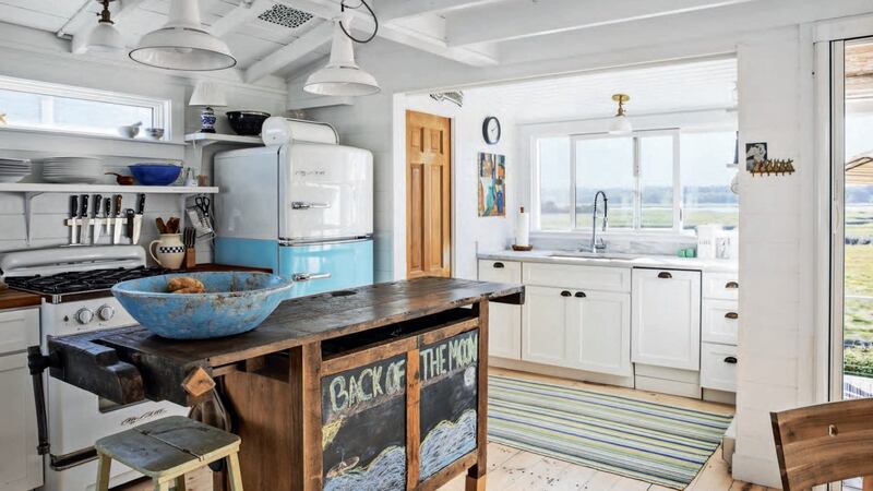 The home of Irish-American photographer Maura McEvoy features a kitchen island that she found on Etsy, from her book, The Maine House (Vendome Press)
