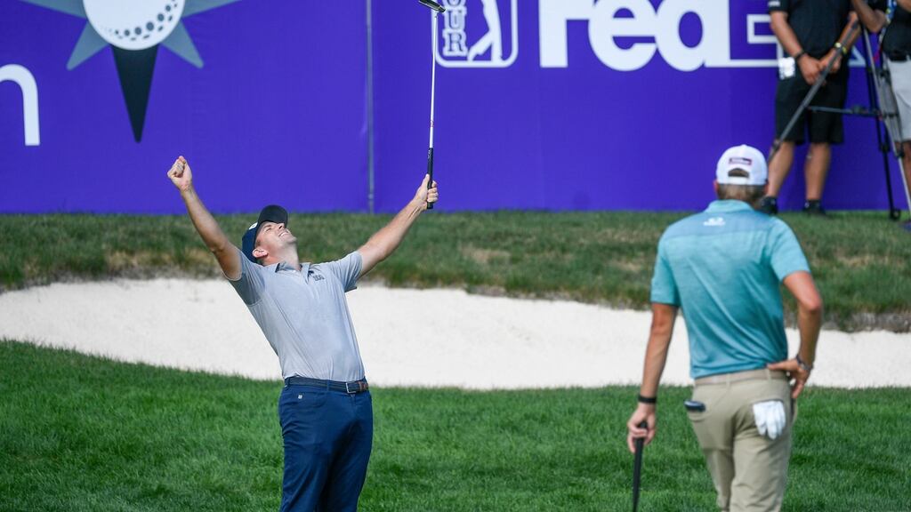 Michael Thompson celebrates after winning the 3M Open. Photo: Raig Lassig/EPA