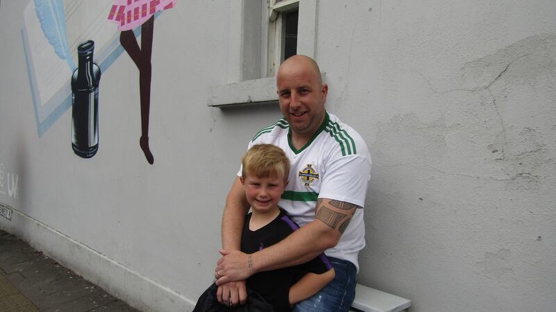 Darryl Guthrie and his six-year-old son Harry.