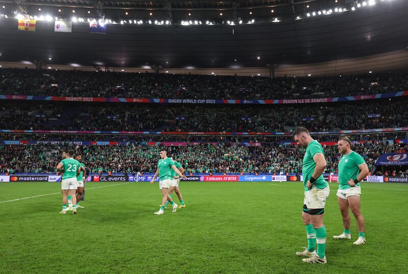 Ireland players try to make a sense of a defeat many did not see coming. Photograph: Dan Sheridan/Inpho 