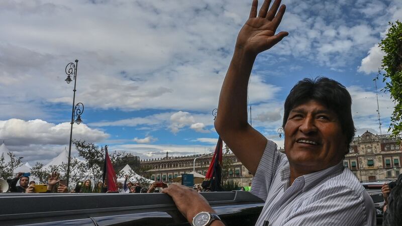 Former Bolivian president Evo Morales waves during a November visit to Mexico City. Photograph: Pedro Pardo/AFP via Getty Images