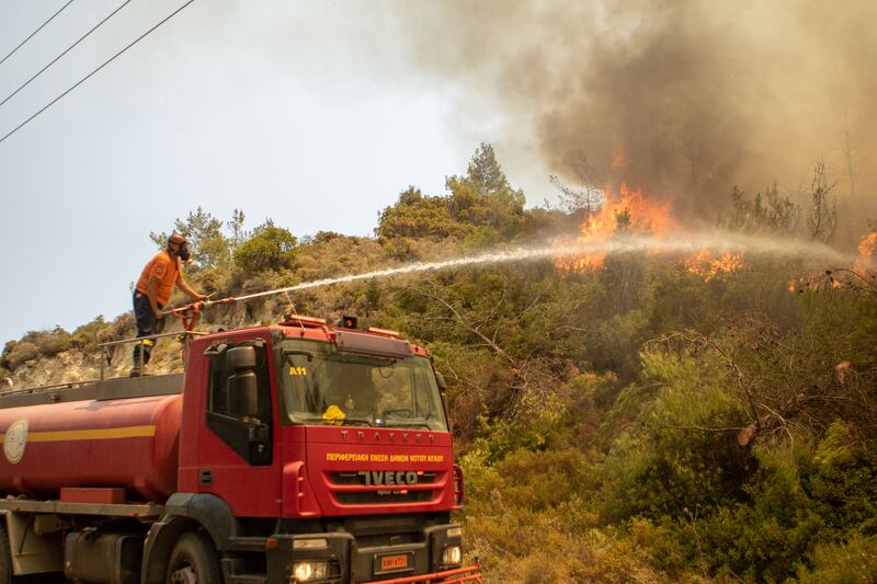 Wildfires last year on the island of Rhodes. Photograph: Getty Images