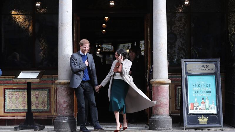 Meghan Markle and Prince Harry leave Crown Bar in Belfast on Friday. Photograph:  Gareth Fuller/Pool/Getty Images.