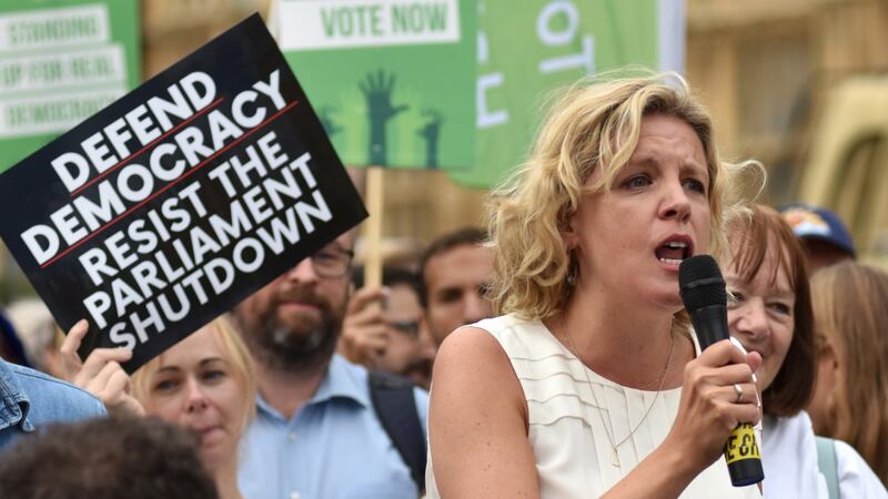 Momentum co-ordinator Laura Parker speaks to protesters as they gather in Westminster to protest against the government proroguing parliament in August. Photograph: John Keeble/Getty