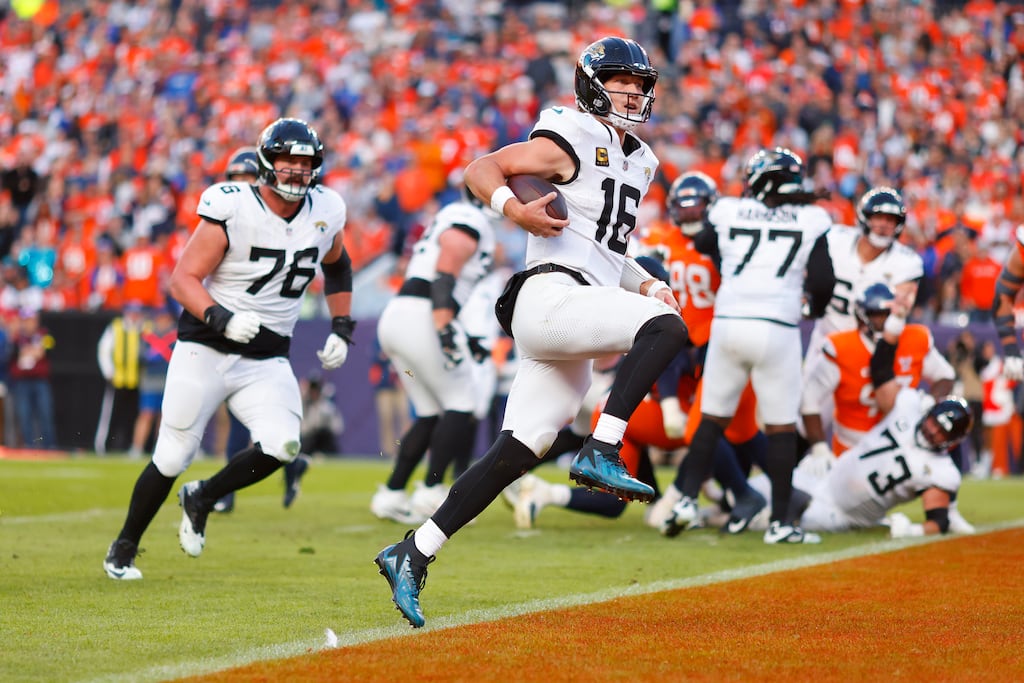 Trevor Lawrence of the Jacksonville Jaguars runs for a third quarter touchdown against the Denver Broncos at Empower Field At Mile High on Sunday. Photograph: Justin Edmonds/Getty Images