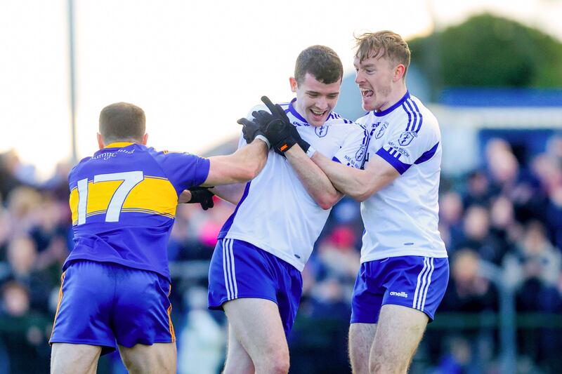 Naas's Eoghan Prizeman celebrates scoring a goal with Paddy McDermott. Photograph: Bryan Keane/Inpho