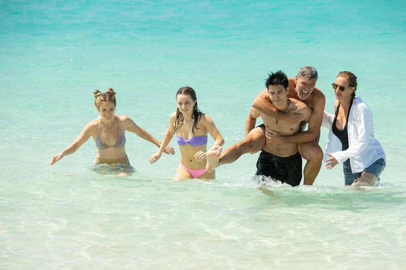 Ticket to Paradise: George Clooney and Julia Roberts with Billie Lourd, Kaitlyn Dever and Maxime Bouttier. Photograph: Vince Valitutti/Universal Pictures