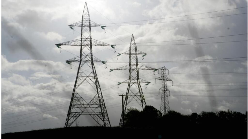 Pylons in Kildare. The €500 million EirGrid project involves installing 200km of high-voltage cables across Cork, Limerick, Tipperary, Waterford, Wexford, Kilkenny, Carlow, Laois, Wicklow and Kildare. Photograph: Bryan O’Brien