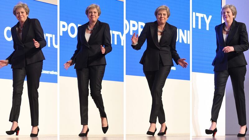 Theresa May dances a few steps as she takes the stage to give her keynote address on the fourth and final day of the Conservative Party Conference. Photograph: Oli Scarff/AFP/Getty Images