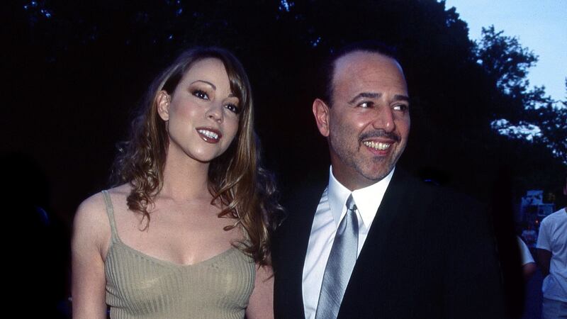 Carey with Tommy Mottola, then head of Sony Music, in 1995, two years after they married. Photograph:  Rose Hartman/Getty Images
